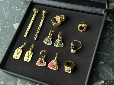 Серьги и кольца Versace